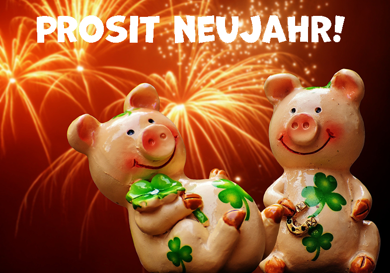 zwei Glücksschweinchen vor einem Feuerwerk-Hintergrund